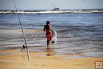 Lone angler with castnet Lone angler with castnet