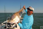 Captain Curtiss Cash and bull redfish Captain Curtiss Cash and bull redfish