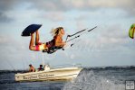 Kite surfer flies Kite surfer flies