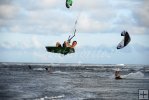 Kite surfer riding high Kite surfer riding high