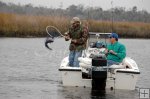 Landing a redfish in winter Landing a redfish in winter